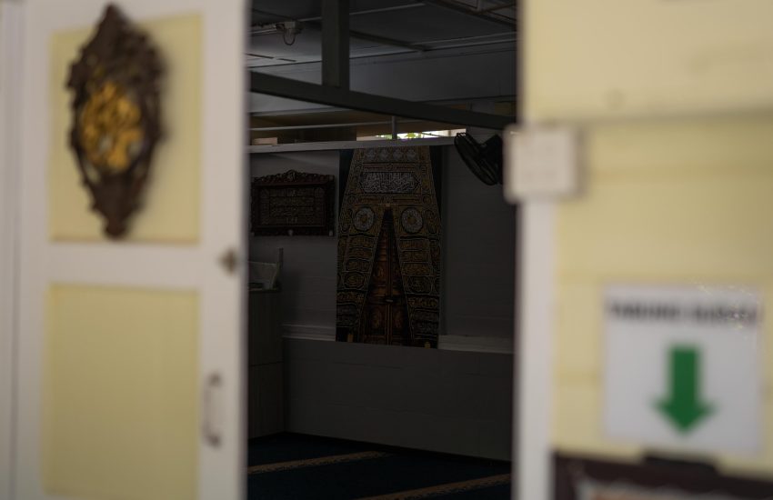 Visit the kampong's place of worship